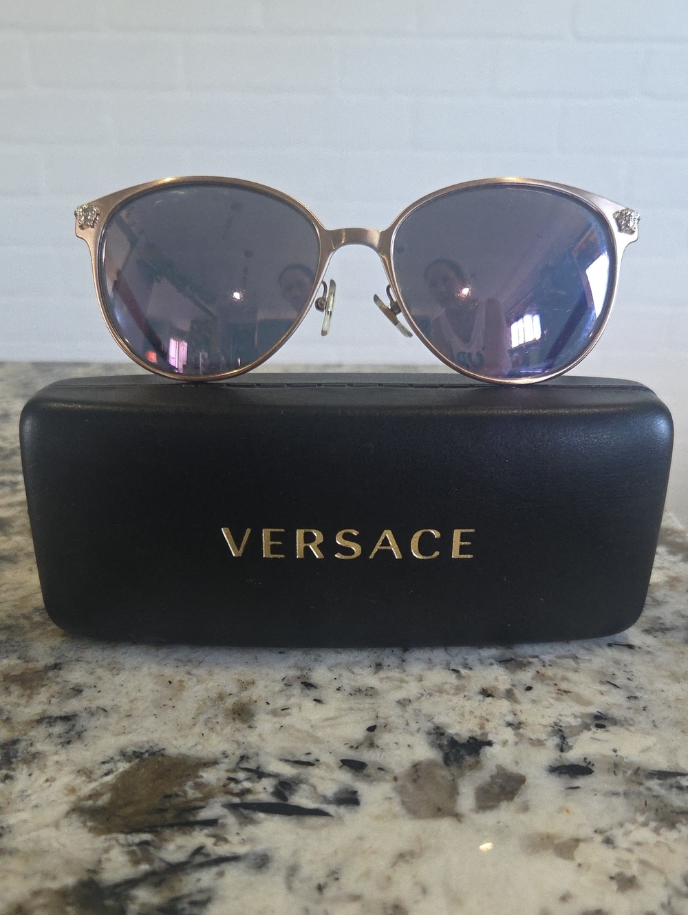 Versace Gold Frame Sunglasses with Purple-Tinted Lenses